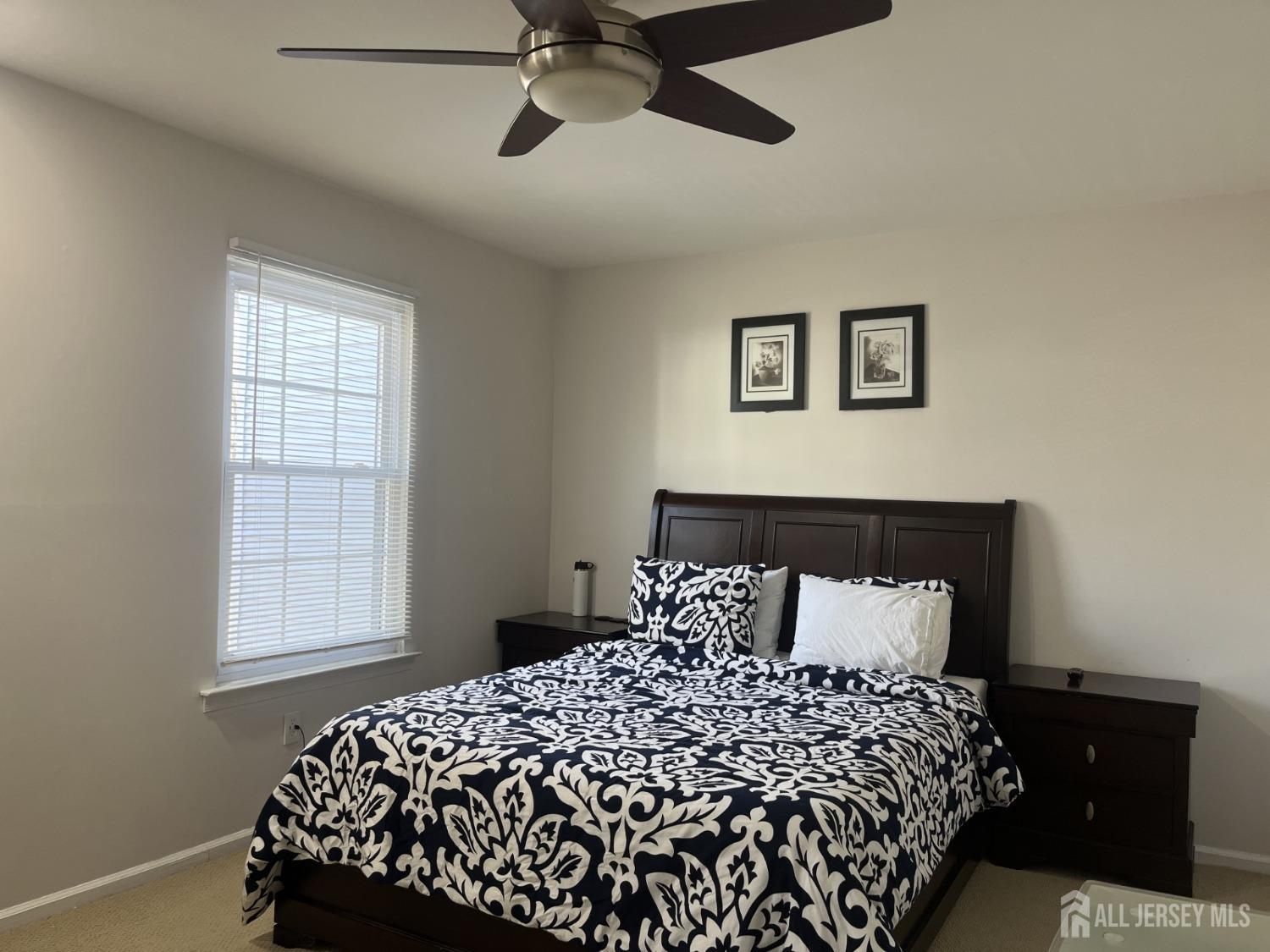 1505 Timber Oaks Road Edison, NJ 08820 - Photo 16 of 27 a bedroom with a bed and window