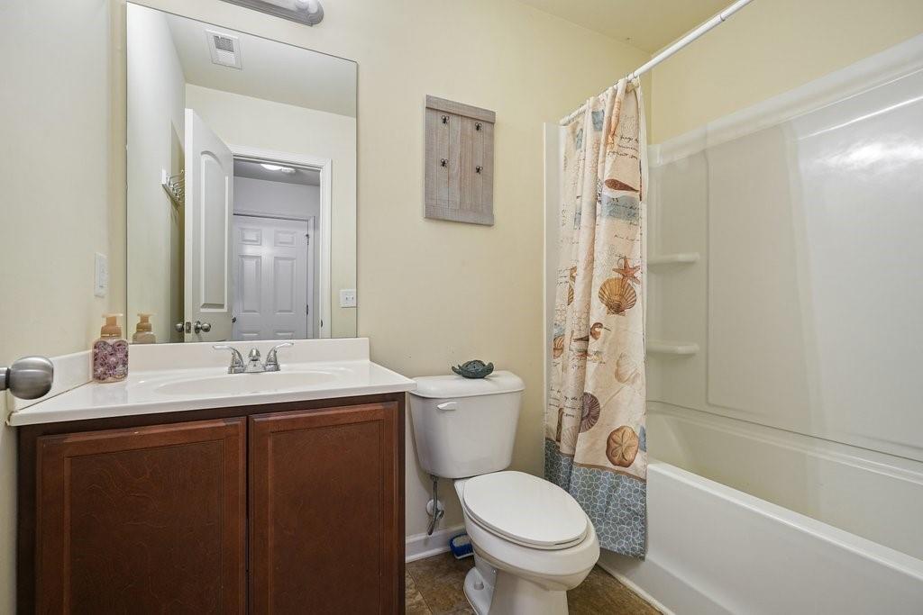 18 Oxford Lane Kingston, GA 30145 - Photo 15 of 33 a bathroom with a sink toilet and shower