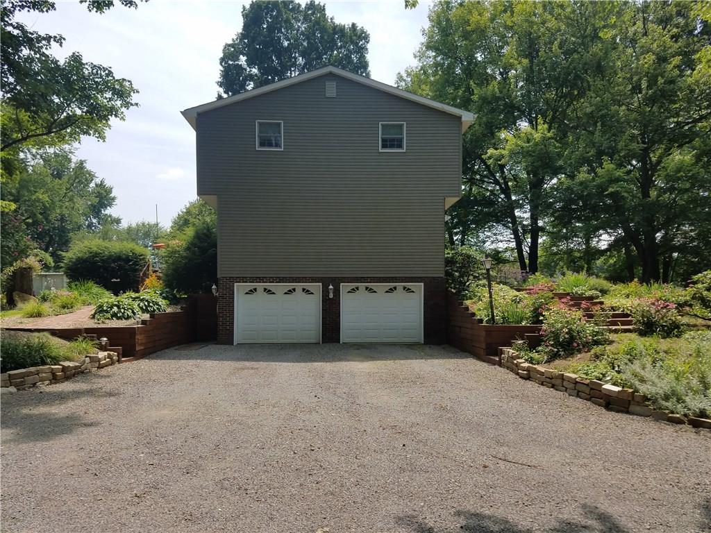226 Knoch Road Saxonburg, PA 16056 - Photo 2 of 23 2 Car integral garage with plenty of additional space for parking including a detached 30x30 Barn!