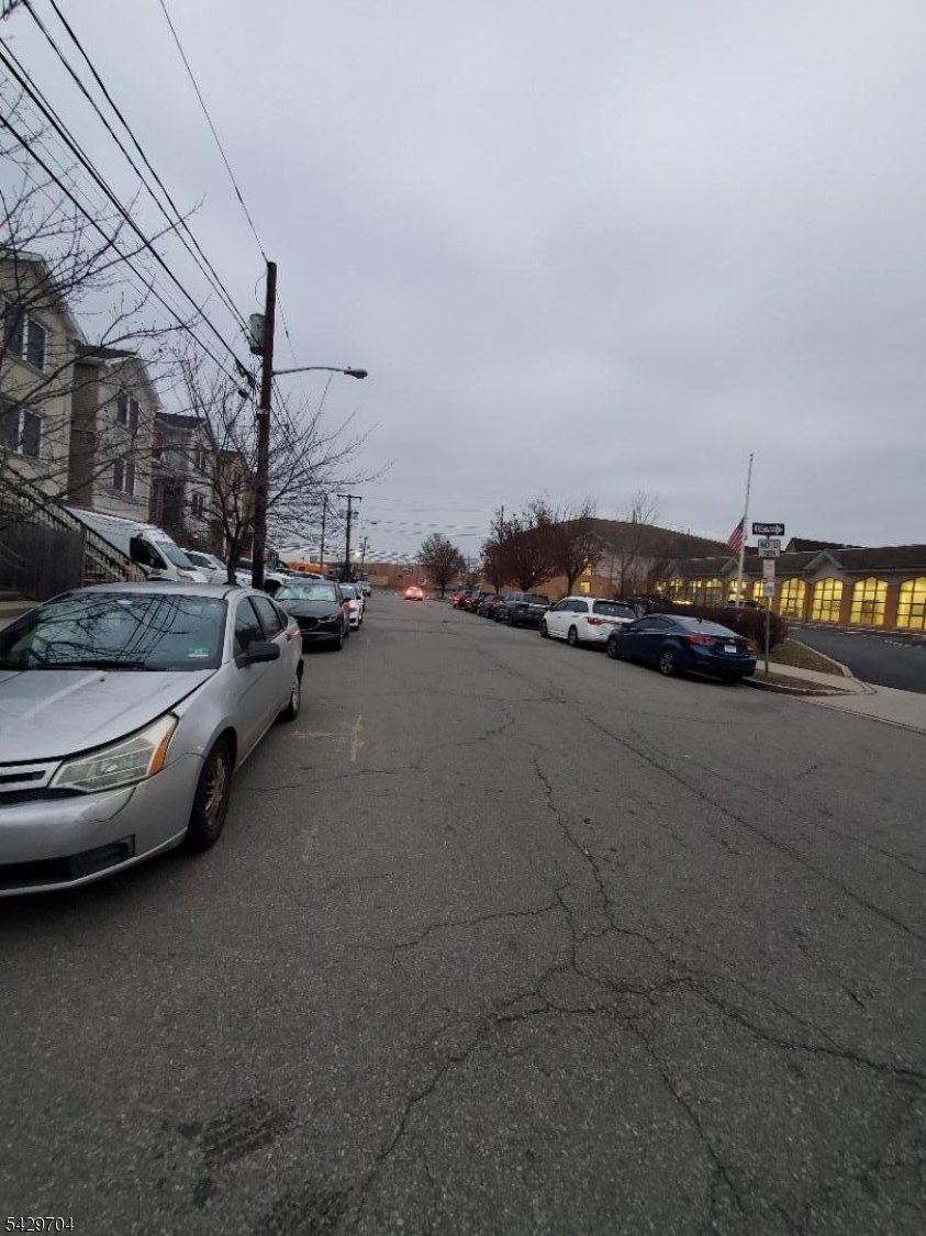 821 Anna Street Elizabeth, NJ 07201 - Photo 4 of 11 a view of street with parked cars