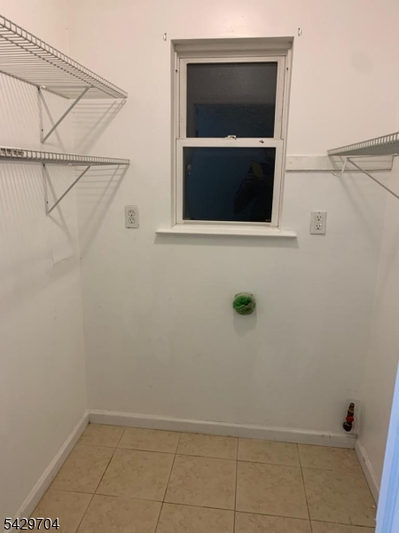 821 Anna Street Elizabeth, NJ 07201 - Photo 7 of 11 a bathroom with a shower
