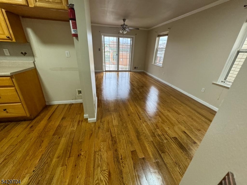 821 Anna Street Elizabeth, NJ 07201 - Photo 8 of 11 a view of entryway with wooden floor