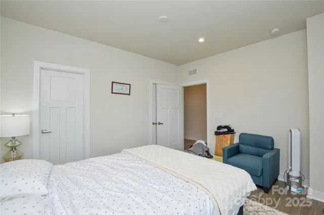 a view of a dining room with furniture and a window