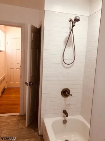 a bathroom with a sink and a shower