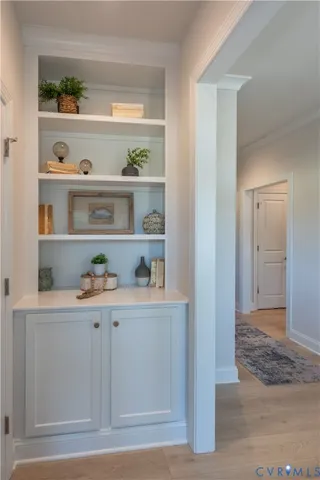 a view of cabinets and wooden floor