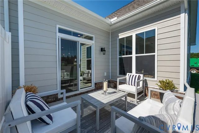 a balcony with furniture and window