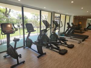 899 Jeffery Street, Unit 601 Boca Raton, FL 33487 - Photo 39 of 47 a view of a room with gym equipment