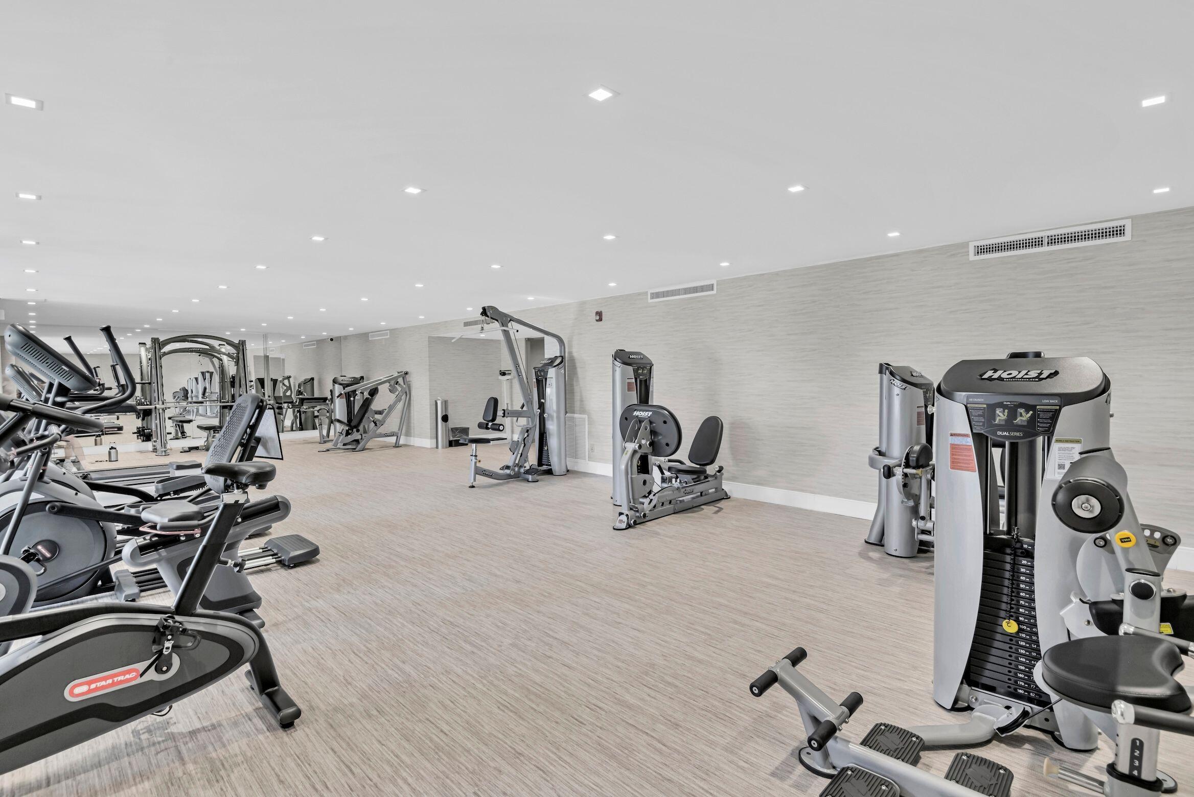 899 Jeffery Street, Unit 601 Boca Raton, FL 33487 - Photo 43 of 47 a view of a room with gym equipment