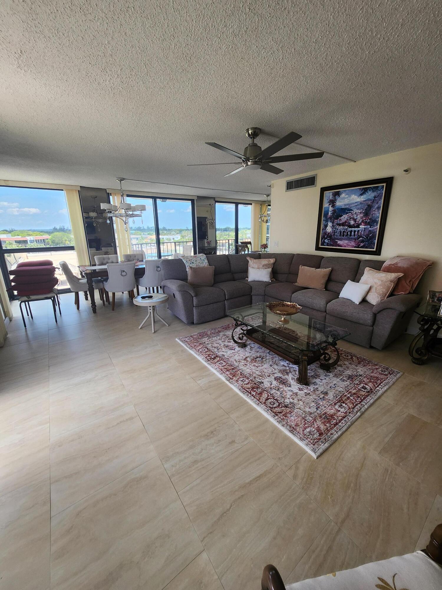 899 Jeffery Street, Unit 601 Boca Raton, FL 33487 - Photo 6 of 47 a living room with furniture and a large window