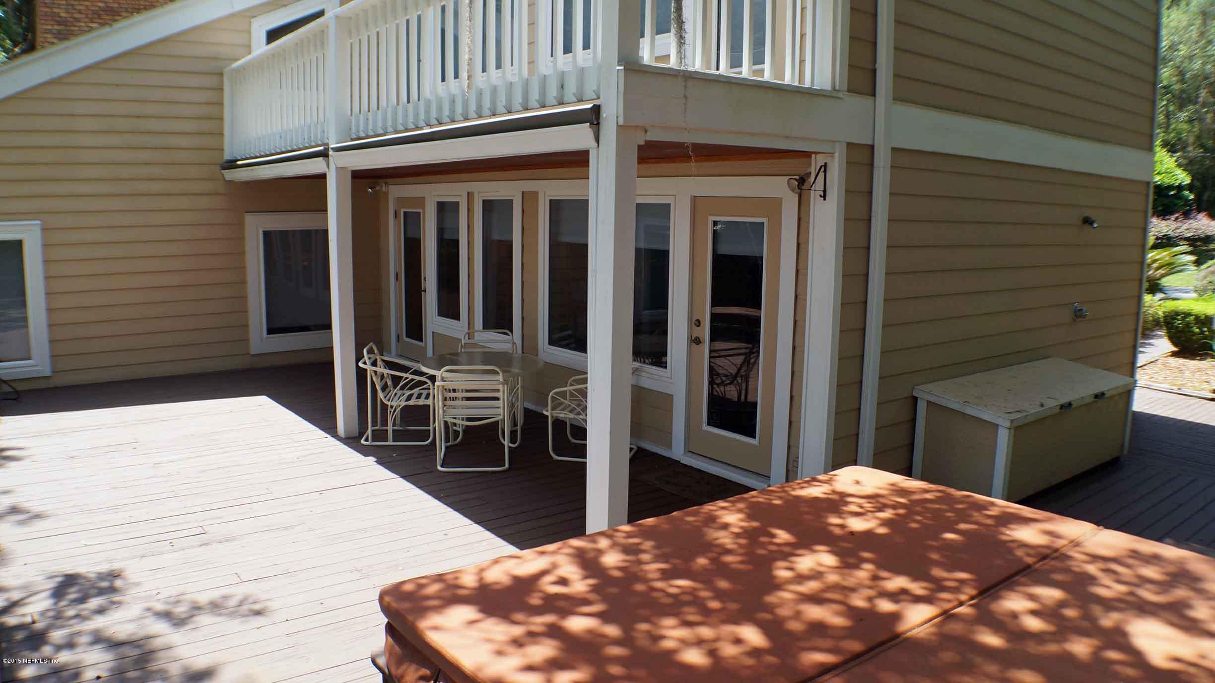 6674 Brooklyn Bay Road Keystone Heights, FL 32656 - Photo 21 of 57 a view of a balcony with chairs