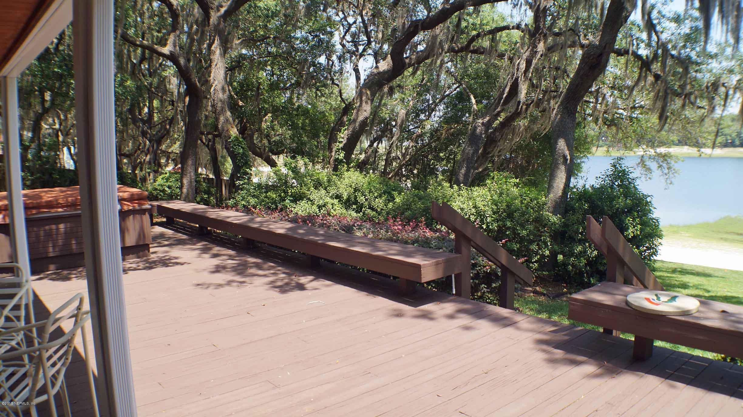 6674 Brooklyn Bay Road Keystone Heights, FL 32656 - Photo 25 of 57 a view of a backyard of the house