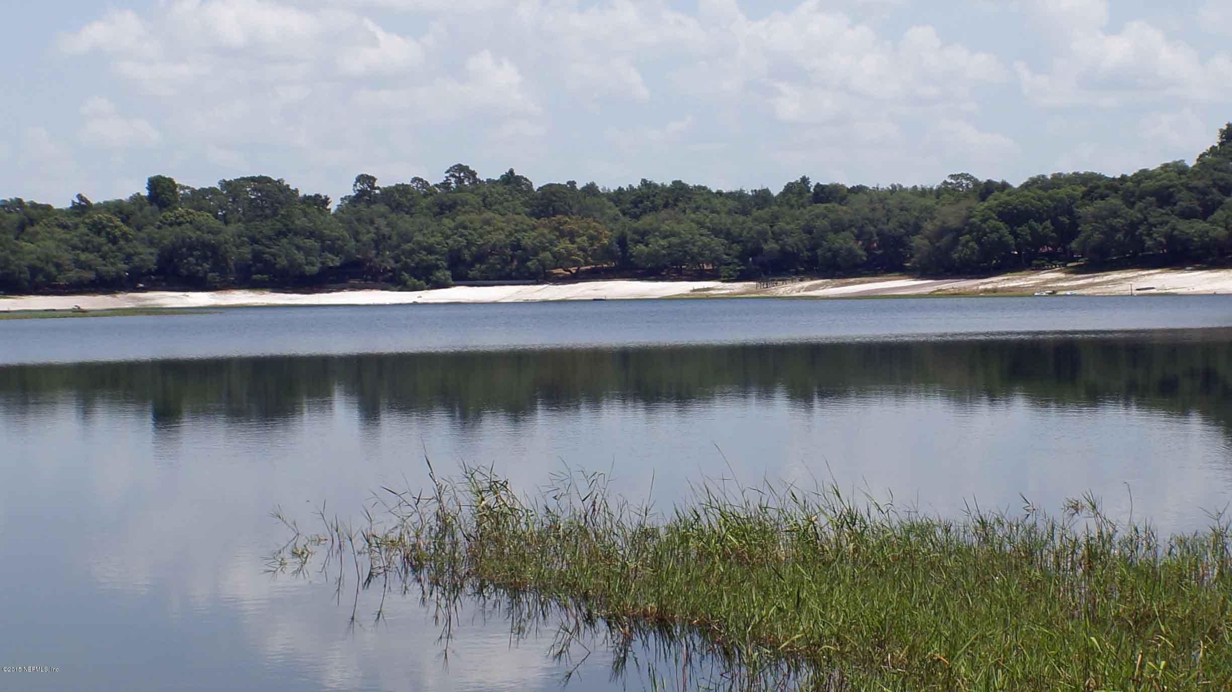 6674 Brooklyn Bay Road Keystone Heights, FL 32656 - Photo 50 of 57 a view of lake with green space