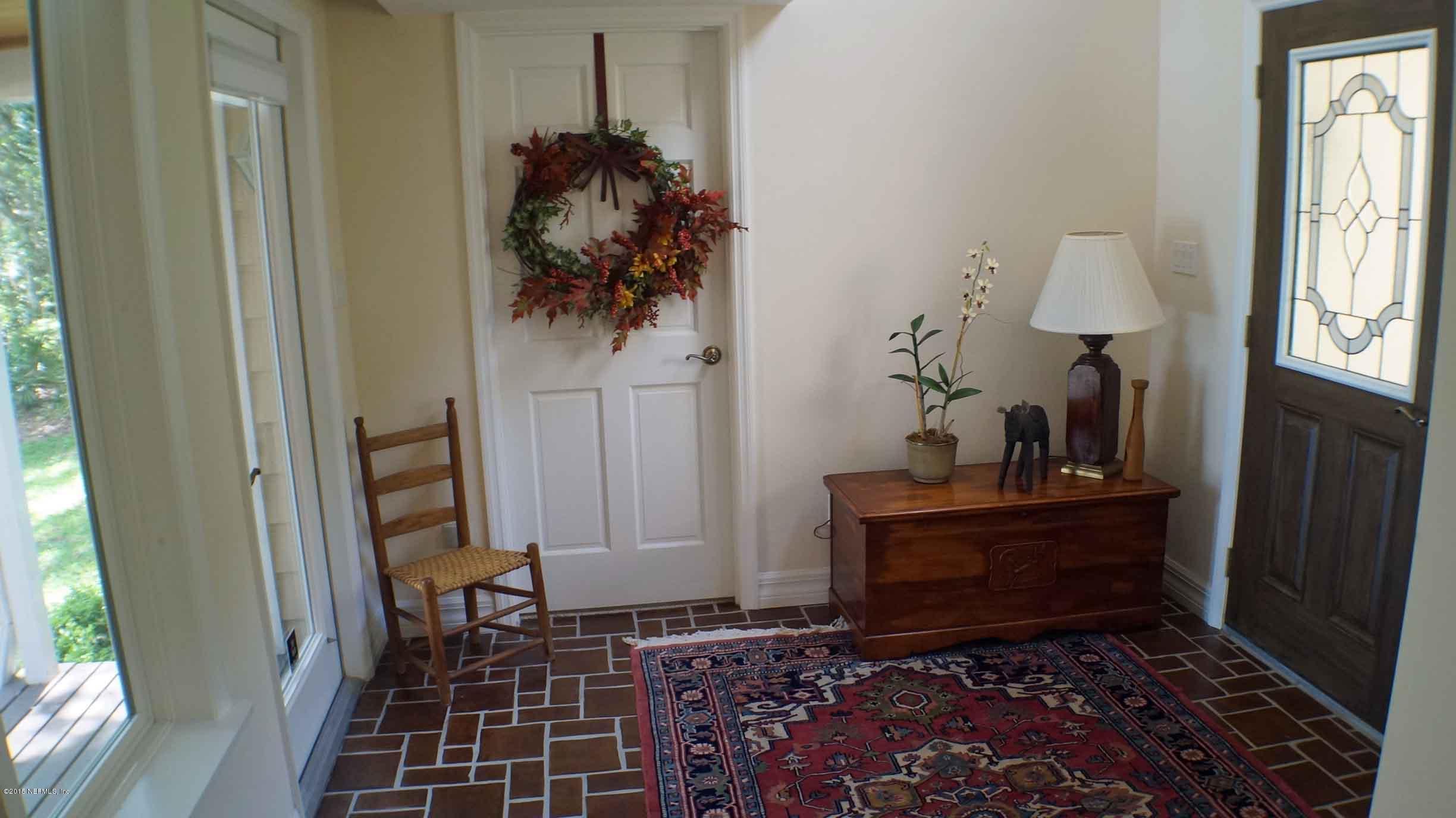 6674 Brooklyn Bay Road Keystone Heights, FL 32656 - Photo 6 of 57 a view of entryway with a rug and wooden floor