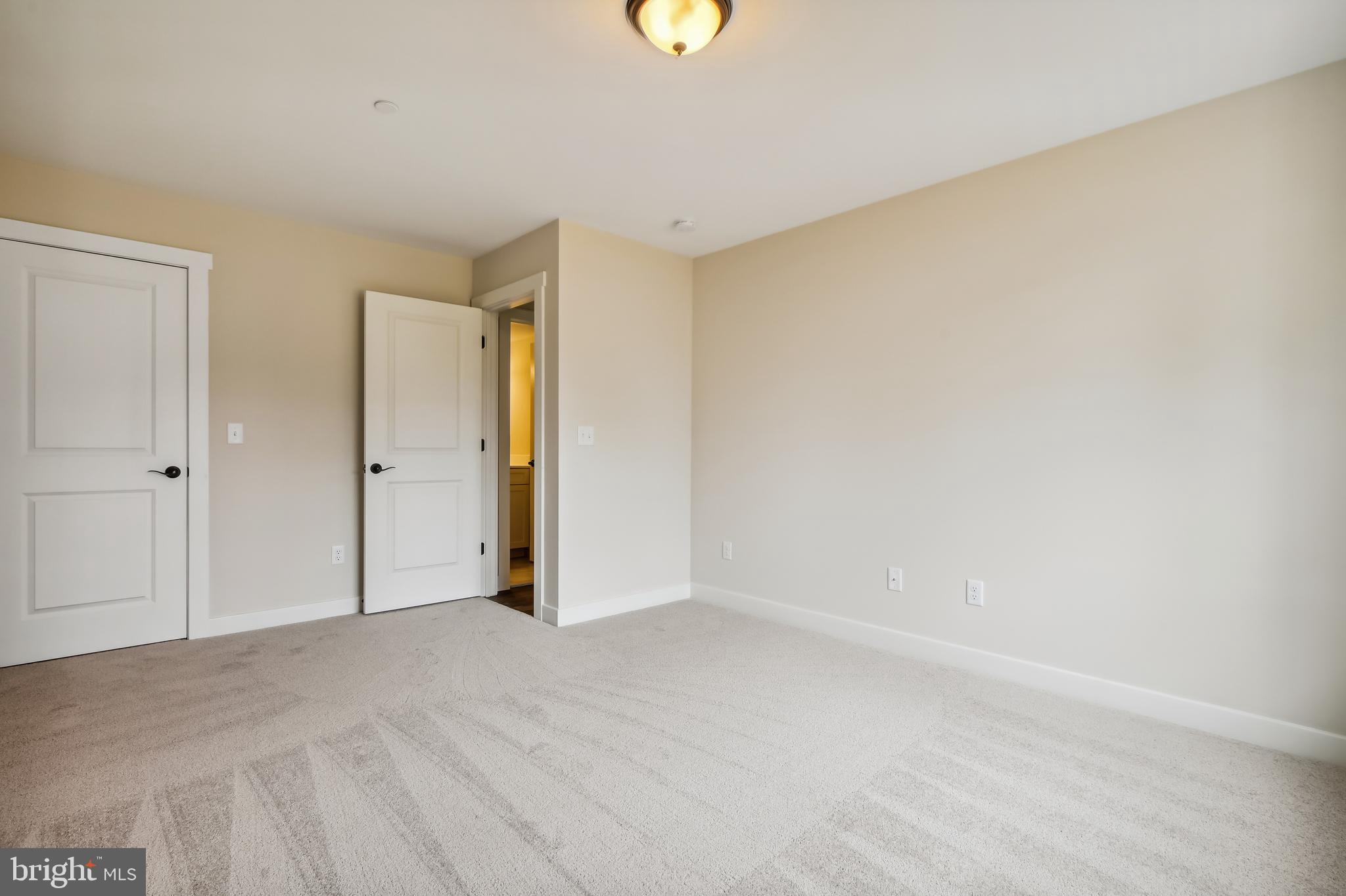 8480 Arbutus Road Pasadena, MD 21122 - Photo 43 of 68 LOWER LEVEL 4TH BEDROOM