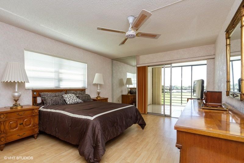 9170 Southwest 14th Street, Unit 4401 Boca Raton, FL 33428 - Photo 7 of 11 06_9170SW14thSt_Apt401_14_MasterBedroom_