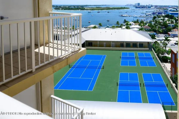 a view of swimming pool with seating area and slide
