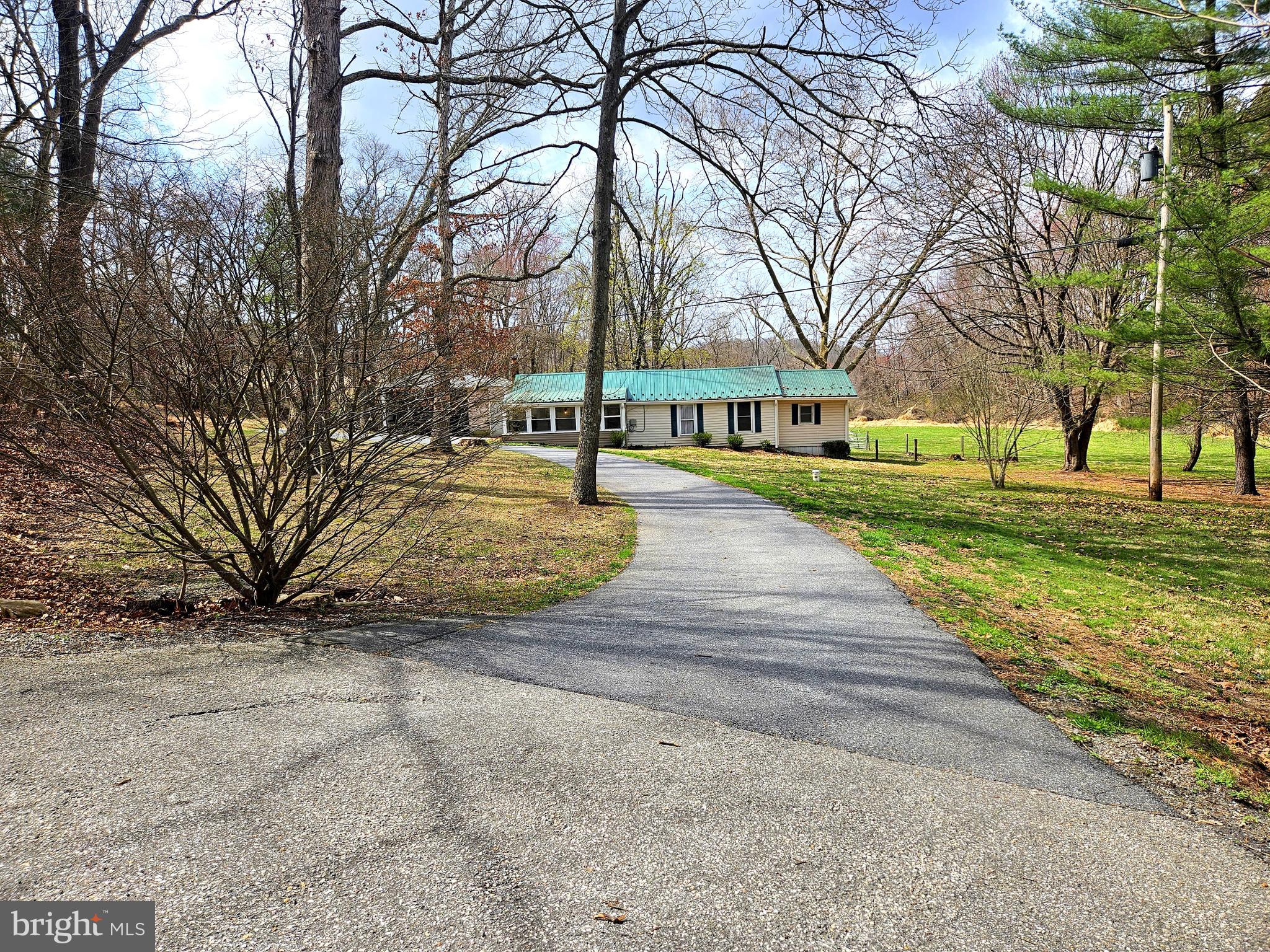 15216 Parrish Road Upperco, MD 21155 - Photo 38 of 38 a view of residential houses with yard and trees