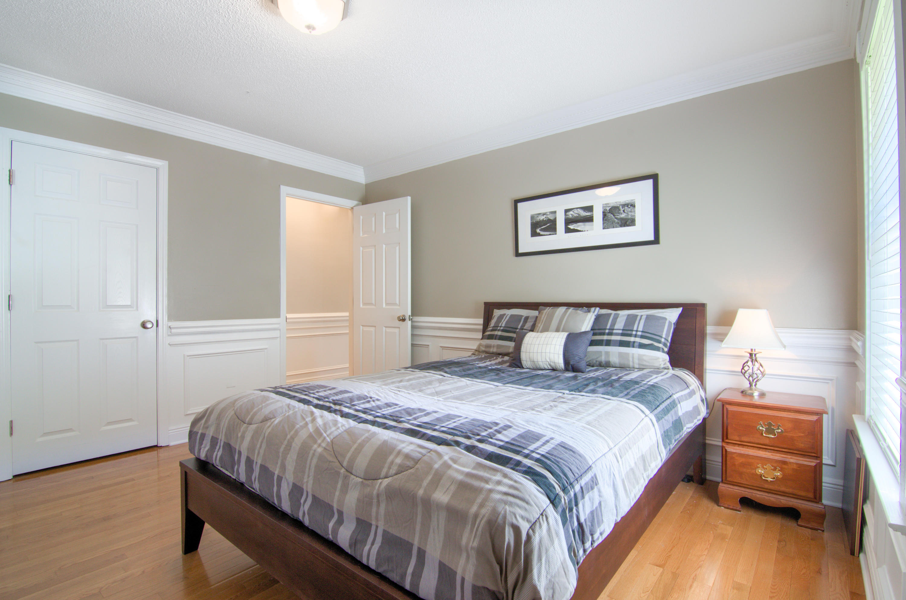3840 Mesa Road Destin, FL 32541 - Photo 3 of 11 a bedroom with a bed and a night stand