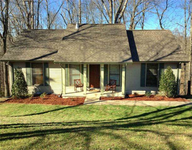7519 King Road Fairview, TN 37062 - Photo 2 of 17 a view of a house with backyard and sitting area