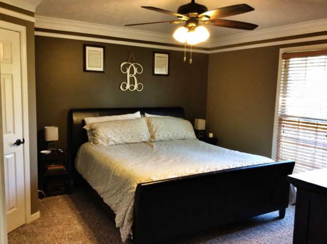 7519 King Road Fairview, TN 37062 - Photo 7 of 17 a bedroom with a bed and a ceiling fan