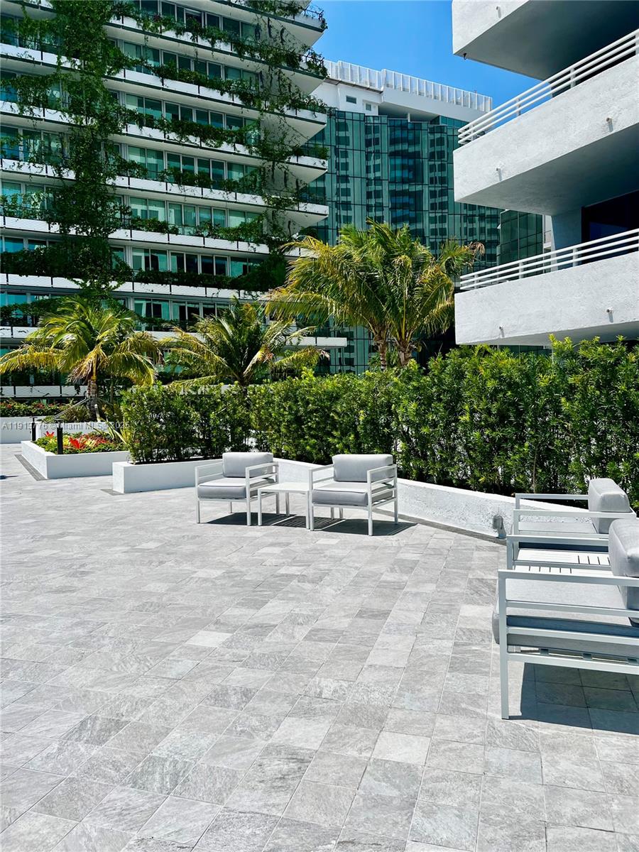 1330 West Avenue, Unit 1807 Miami Beach, FL 33139 - Photo 13 of 17 a view of a yard with plants