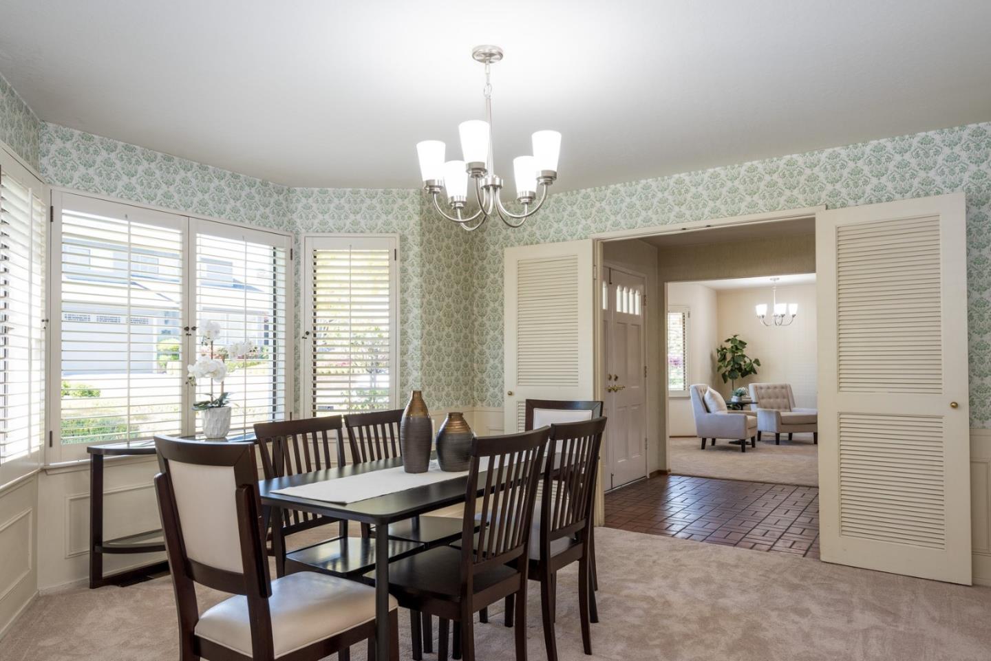 237 Timothy Drive San Carlos, CA 94070 - Photo 15 of 30 a view of a dining room with furniture and a chandelier
