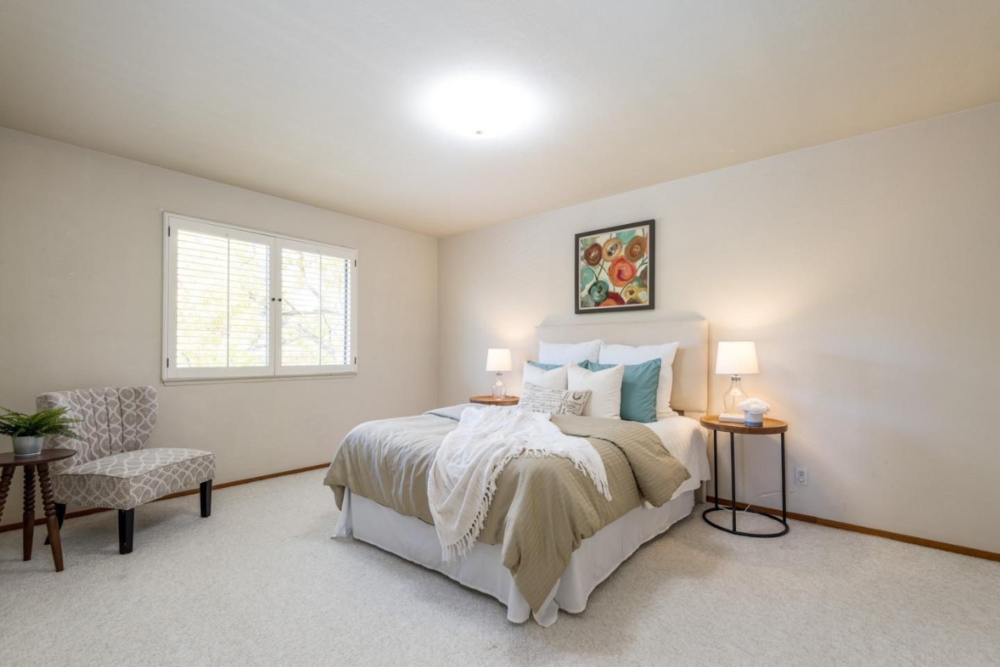 237 Timothy Drive San Carlos, CA 94070 - Photo 20 of 30 a bedroom with a bed and chair