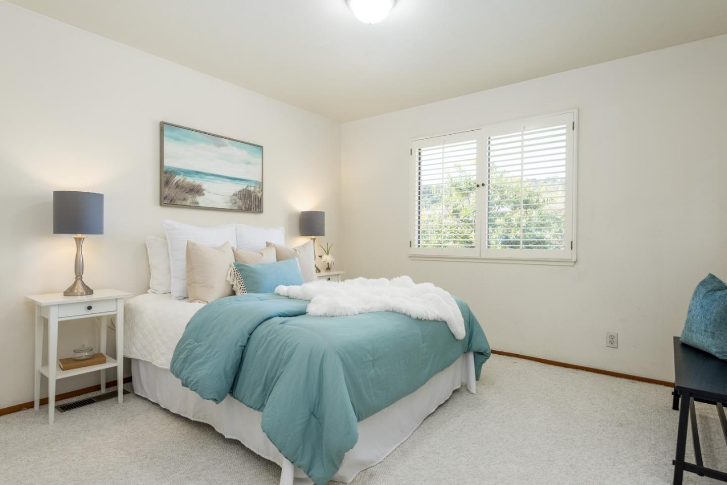237 Timothy Drive San Carlos, CA 94070 - Photo 21 of 30 a bedroom with a bed and a window