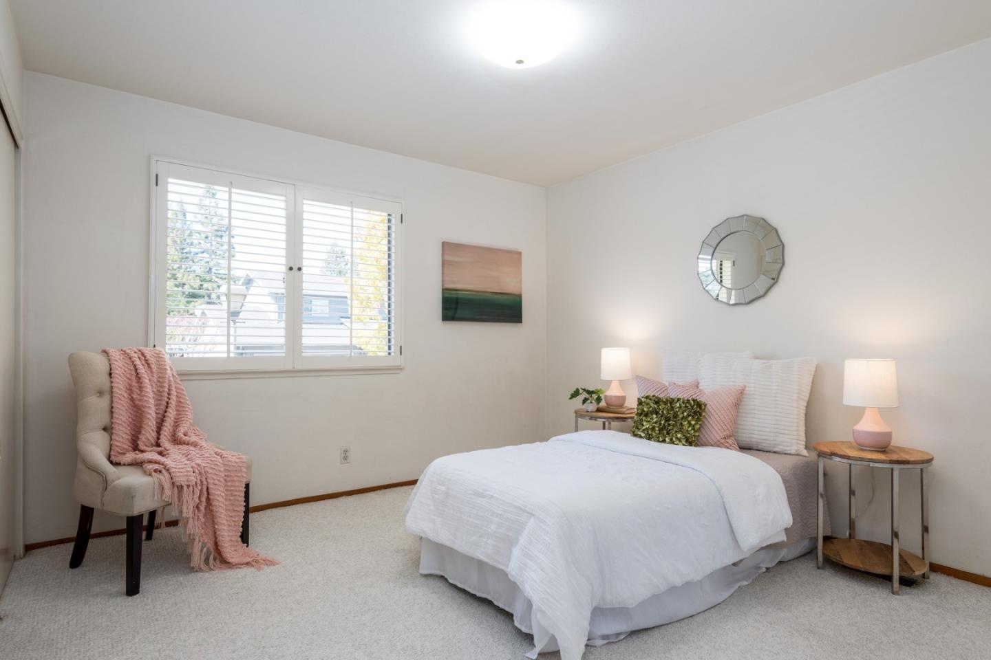 237 Timothy Drive San Carlos, CA 94070 - Photo 24 of 30 a bedroom with a bed and a window