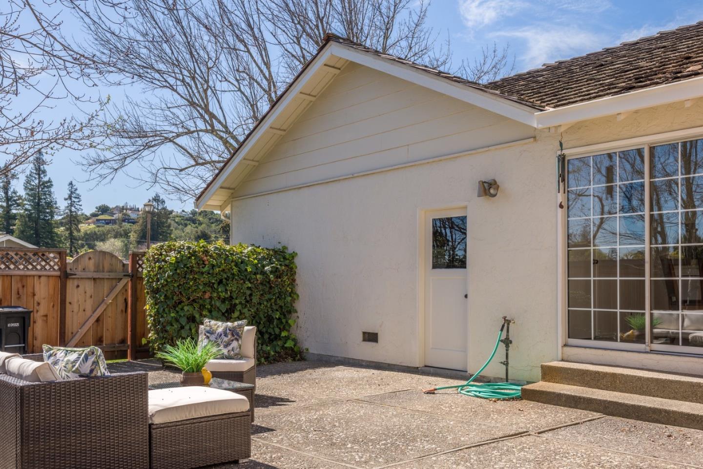 237 Timothy Drive San Carlos, CA 94070 - Photo 28 of 30 a backyard of a house with outdoor seating