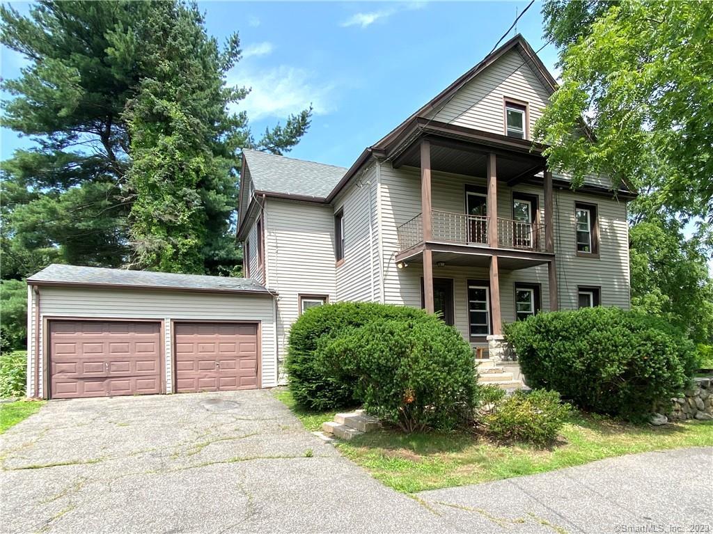 90 Weingart Road Harwinton, CT 06791 - Photo 1 of 1 a front view of a house with a yard and garage