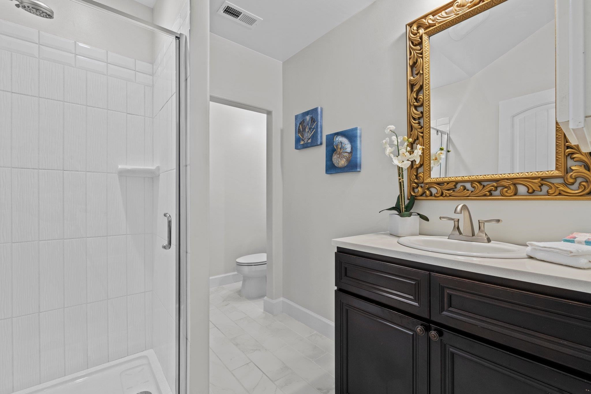 525 Eatmon Road Zebulon, NC 27597 - Photo 24 of 30 Full bathroom in apartment above garage including walk in shower. Apartment Bathroom