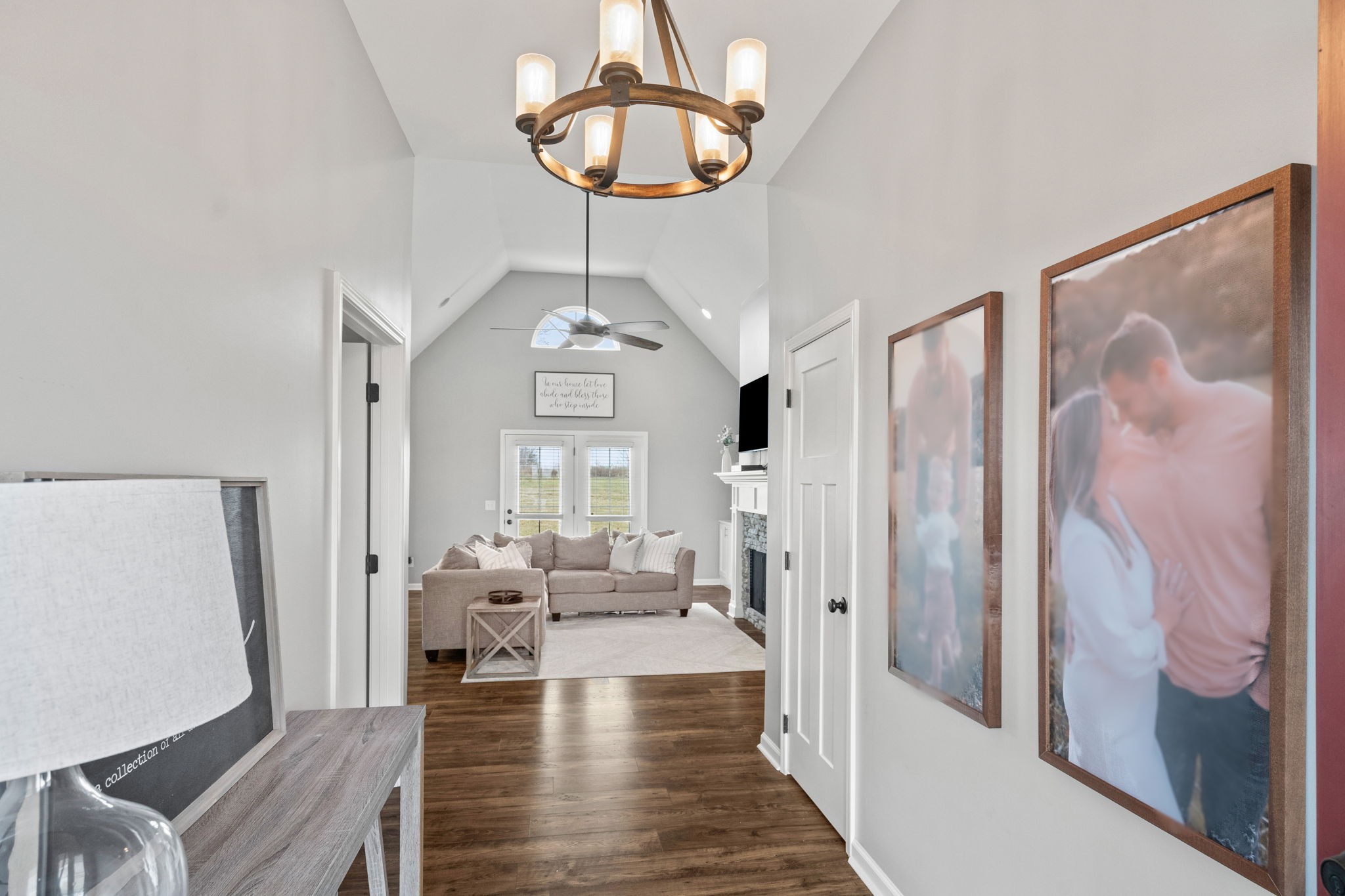 3706 Calista Road White House, TN 37188 - Photo 12 of 55 a living room with furniture and a chandelier