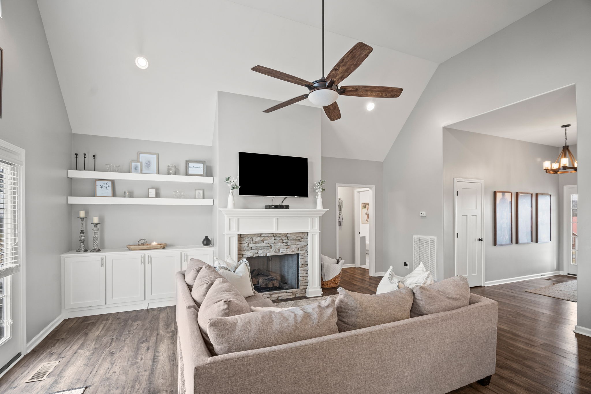 3706 Calista Road White House, TN 37188 - Photo 16 of 55 a living room with furniture a fireplace and a flat screen tv