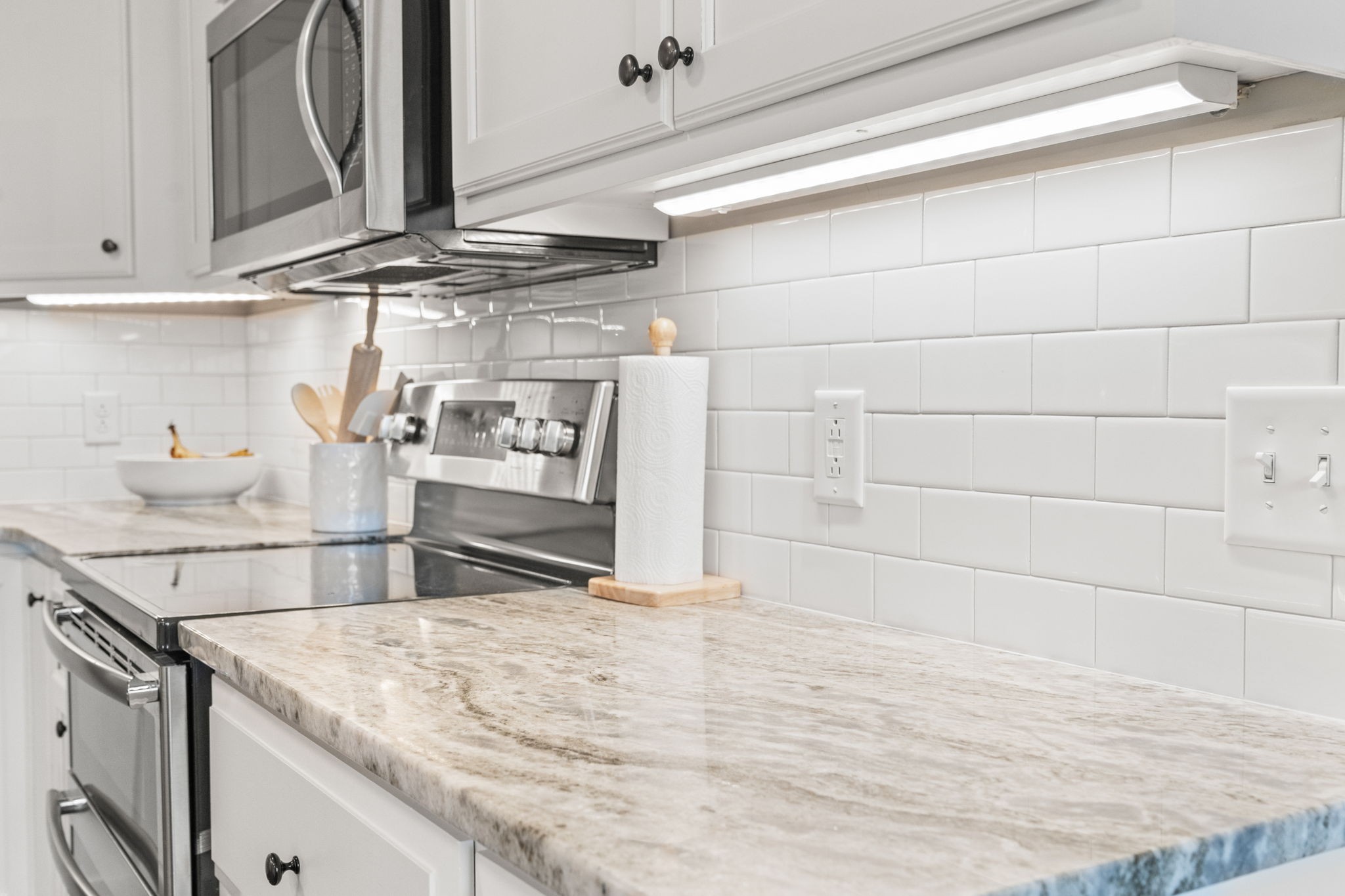 3706 Calista Road White House, TN 37188 - Photo 19 of 55 a kitchen with stainless steel appliances granite countertop a sink and cabinets