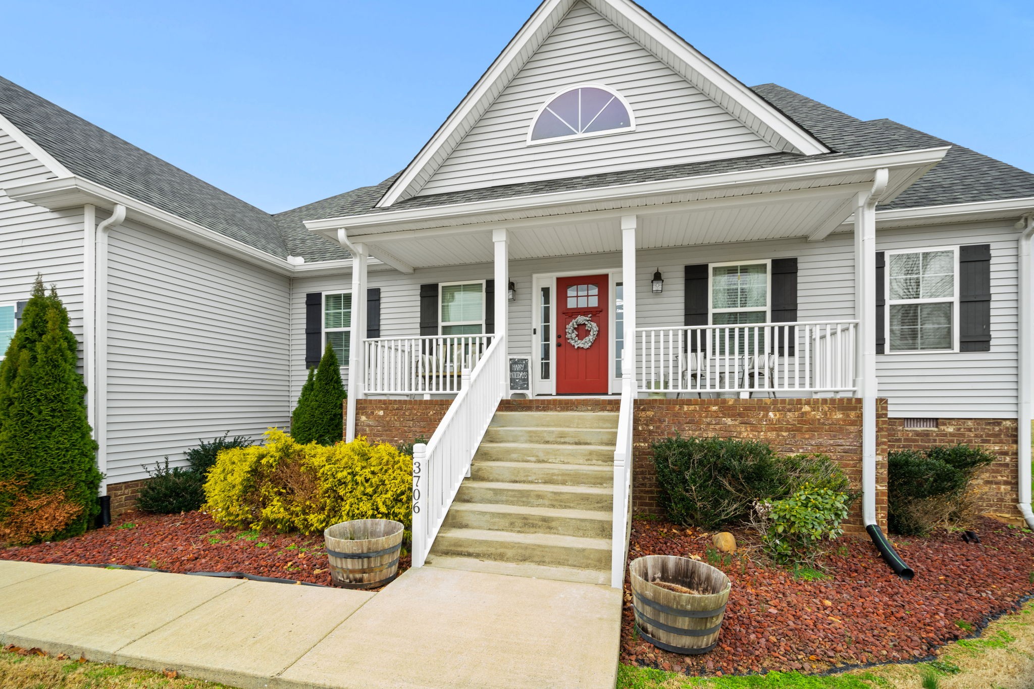 3706 Calista Road White House, TN 37188 - Photo 2 of 55 a front view of a house with garden