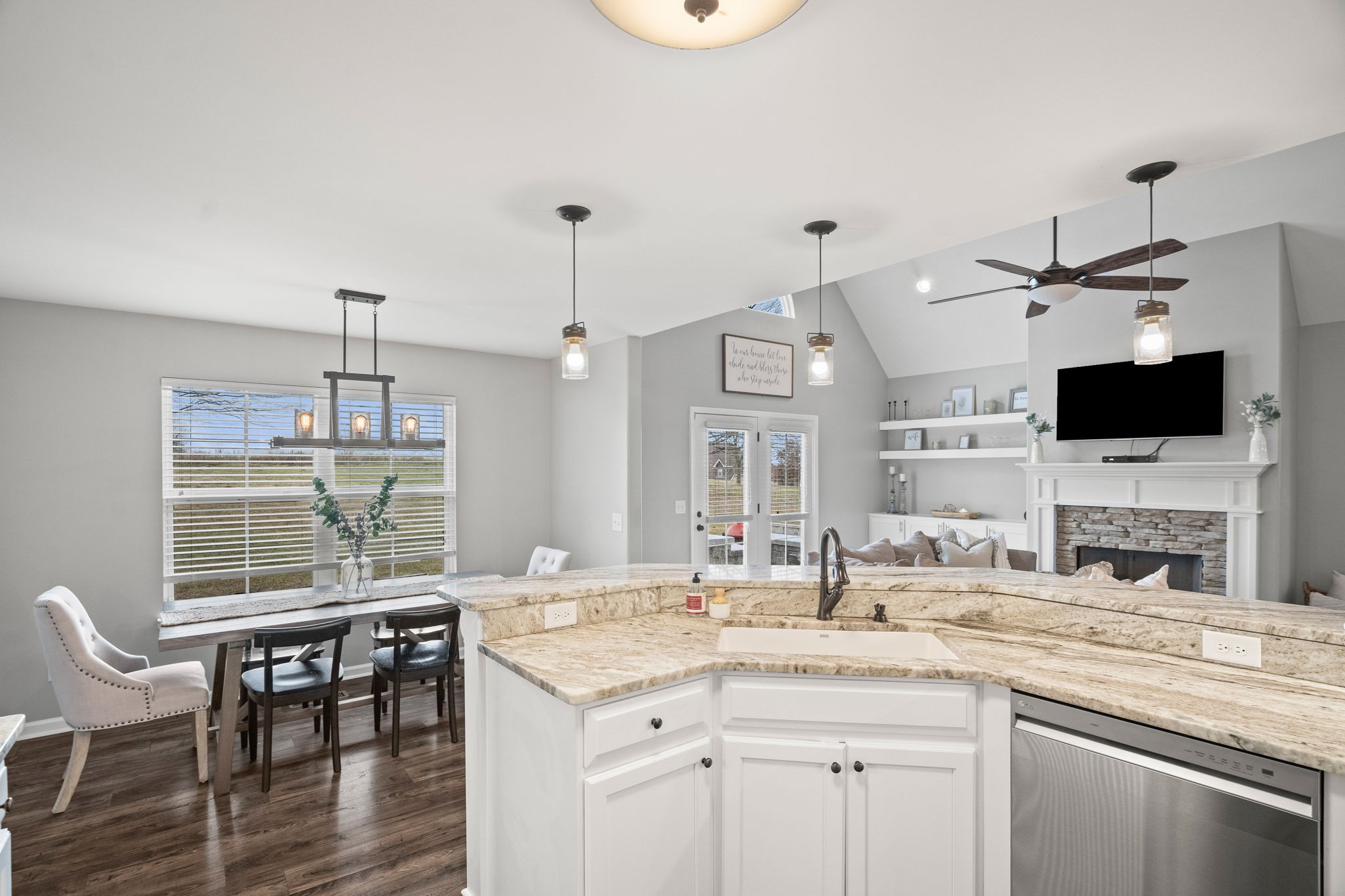 3706 Calista Road White House, TN 37188 - Photo 23 of 55 a kitchen with granite countertop a sink and a stove