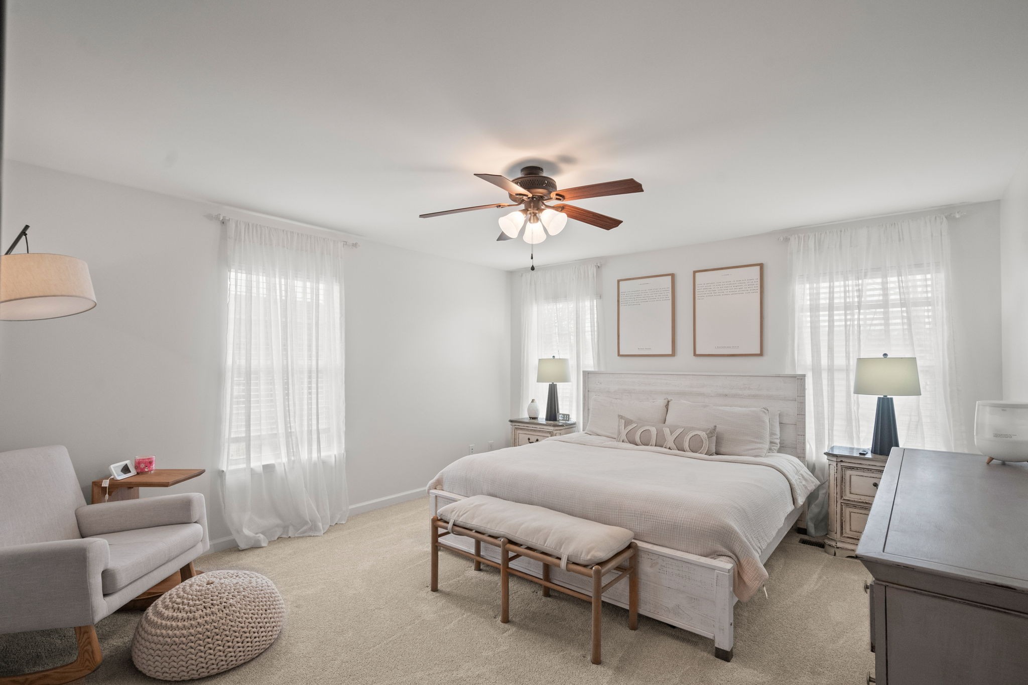 3706 Calista Road White House, TN 37188 - Photo 30 of 55 a bedroom with a bed and a chandelier