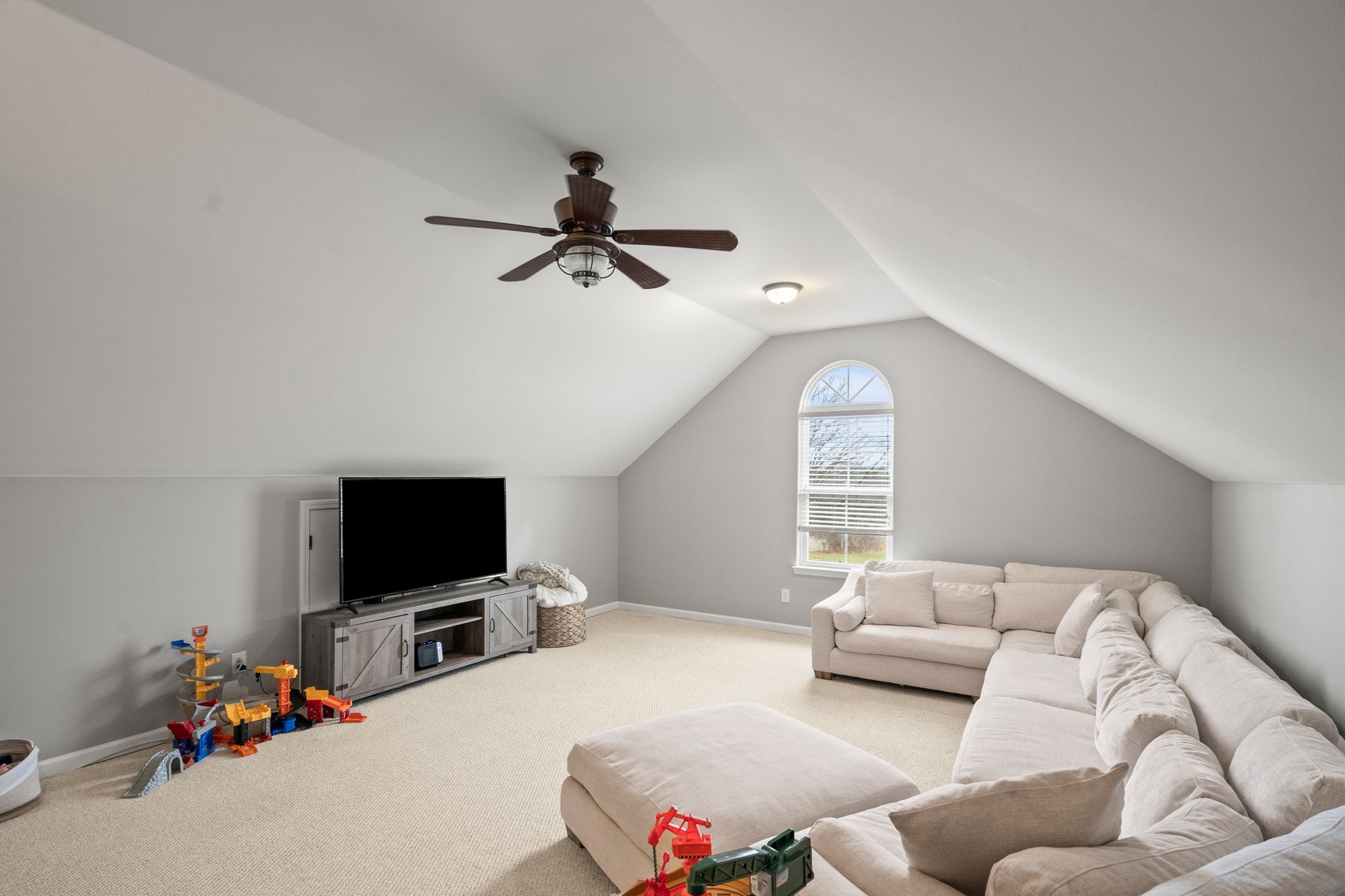 3706 Calista Road White House, TN 37188 - Photo 35 of 55 a living room with furniture and a flat screen tv
