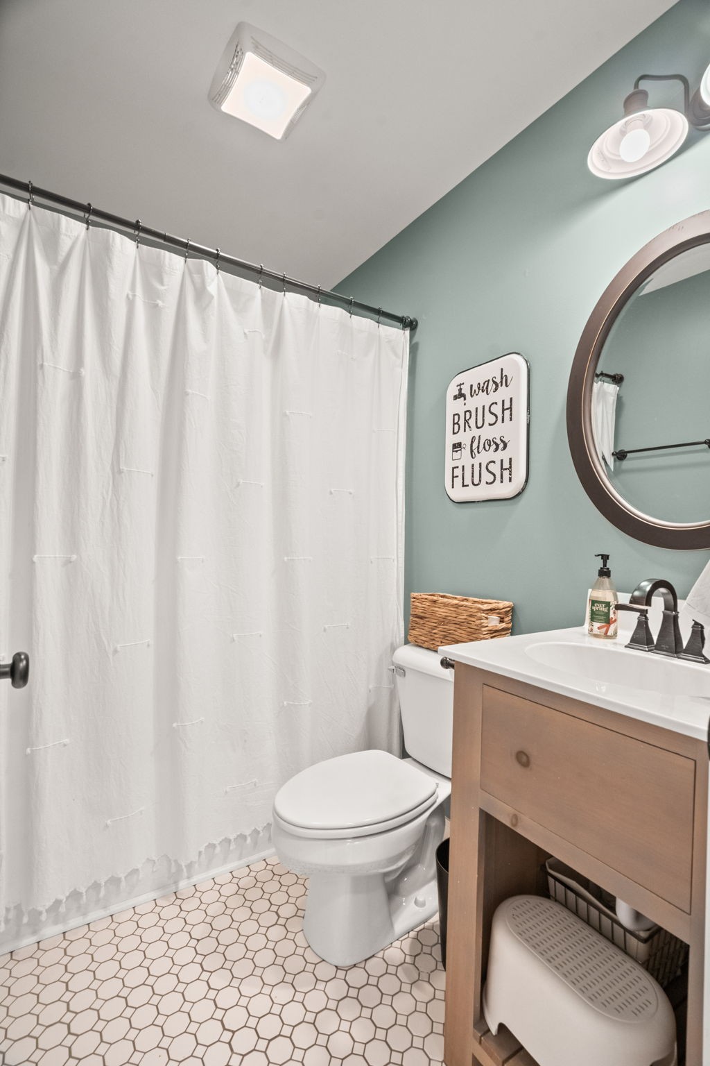 3706 Calista Road White House, TN 37188 - Photo 39 of 55 a bathroom with a toilet a sink and a shower