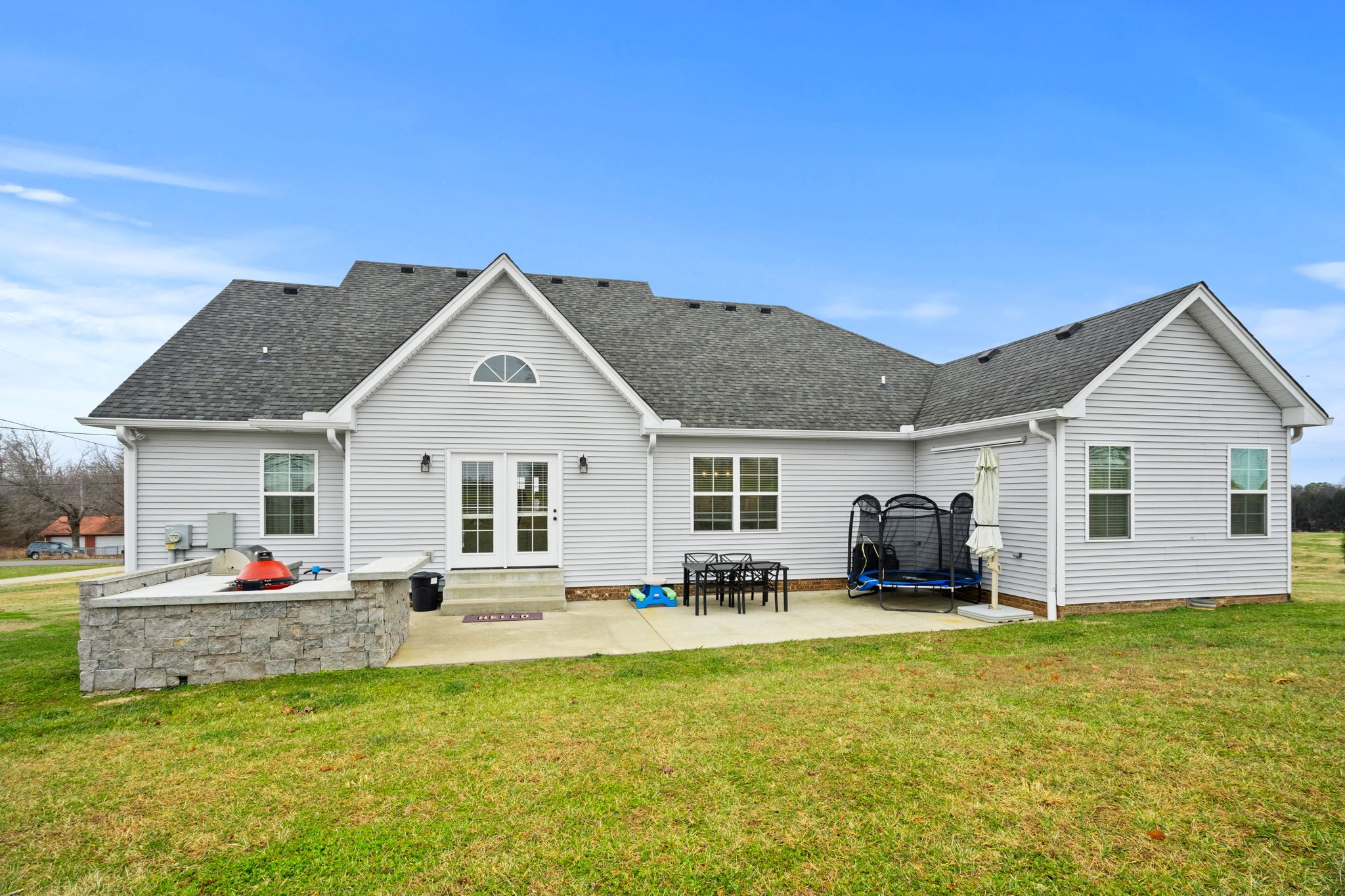 3706 Calista Road White House, TN 37188 - Photo 42 of 55 a front view of house with yard and trees in the background
