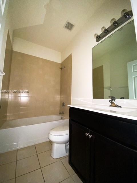 11487 Southwest 248th Lane Homestead, FL 33032 - Photo 14 of 16 a bathroom with a sink a toilet a mirror and shower