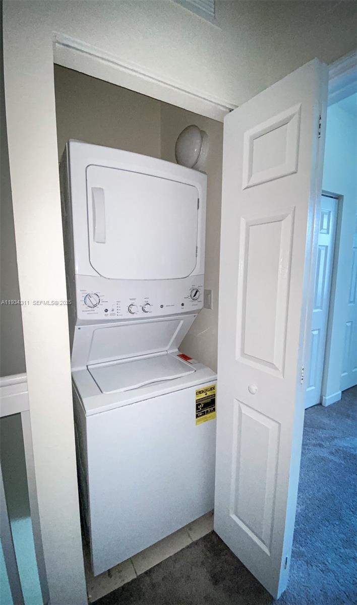 11487 Southwest 248th Lane Homestead, FL 33032 - Photo 16 of 16 a utility room with dryer and washer