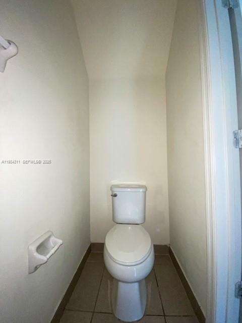 11487 Southwest 248th Lane Homestead, FL 33032 - Photo 7 of 16 a bathroom with a toilet