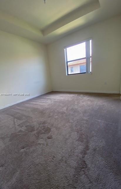 11487 Southwest 248th Lane Homestead, FL 33032 - Photo 9 of 16 an empty room with a window