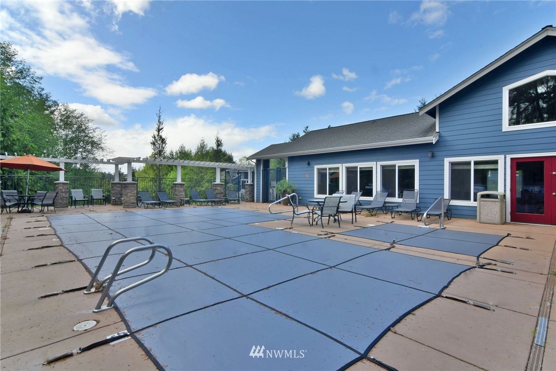 3926 243rd Place Southeast, Unit H304 Bothell, WA 98021 - Photo 22 of 23 a outdoor view with a sitting space