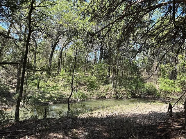 a backyard of a house with a yard