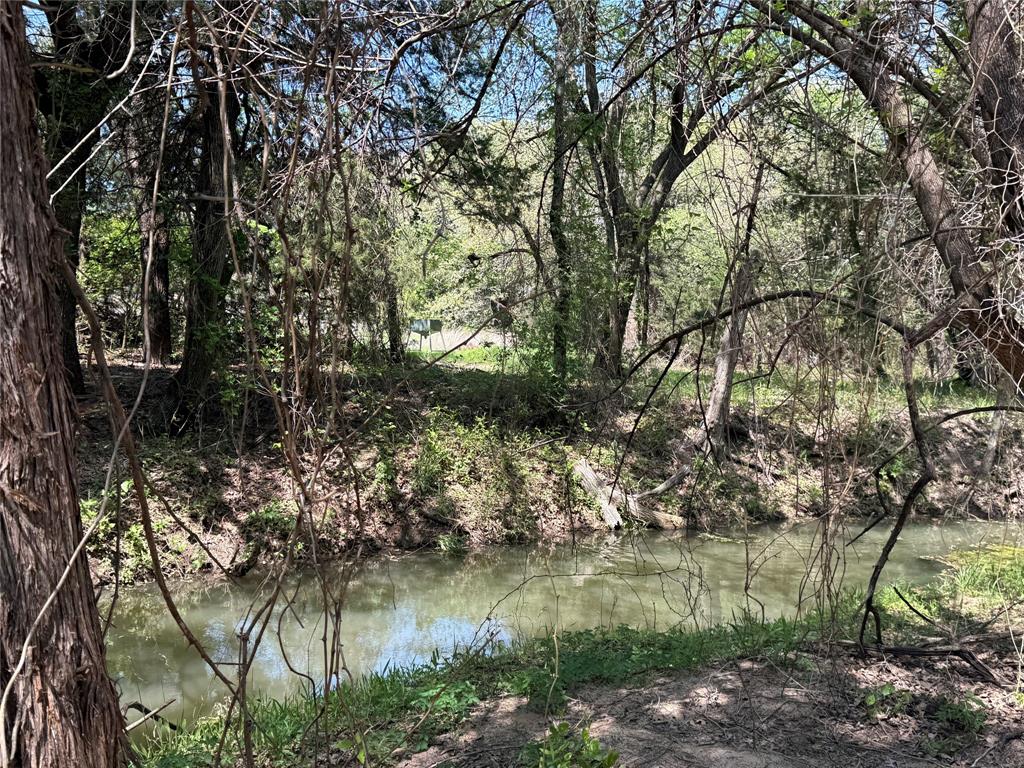 261 Catholic Cemetery Road Montague, TX 76251 - Photo 33 of 40 a view of lake with green space