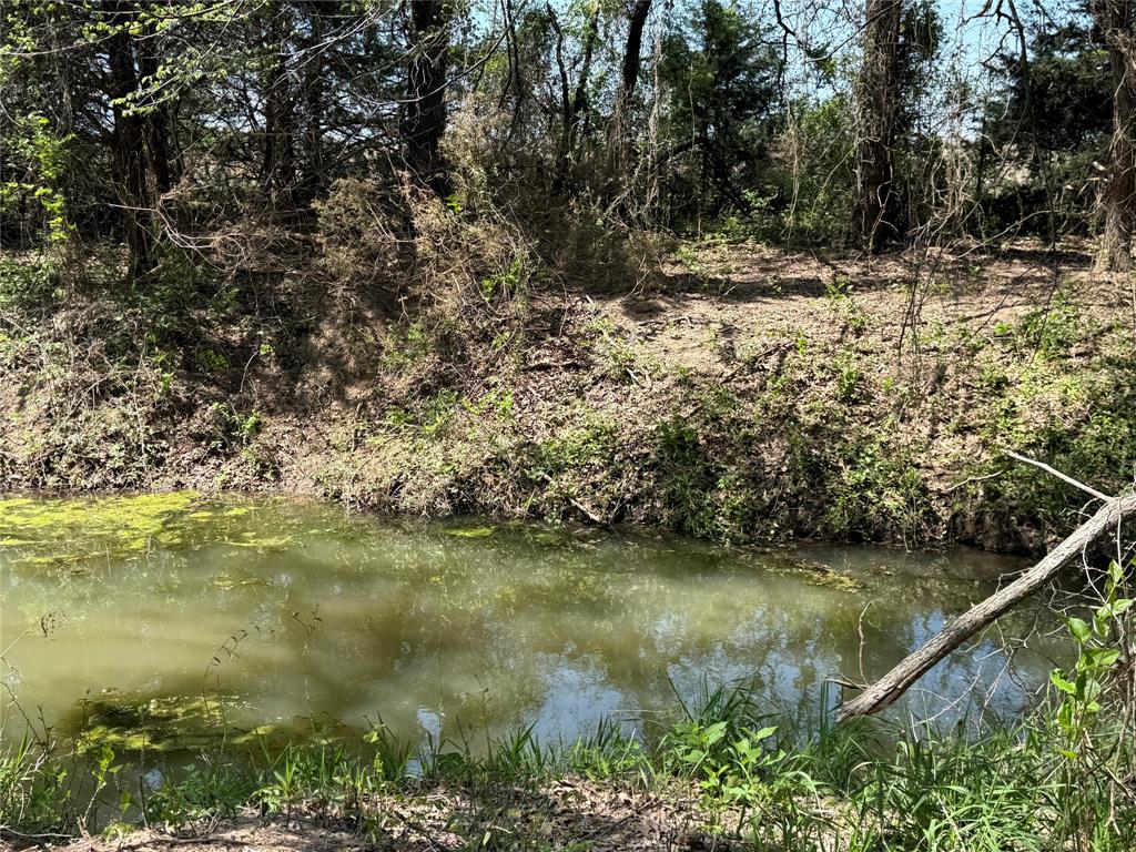 261 Catholic Cemetery Road Montague, TX 76251 - Photo 34 of 40 a view of a lake view
