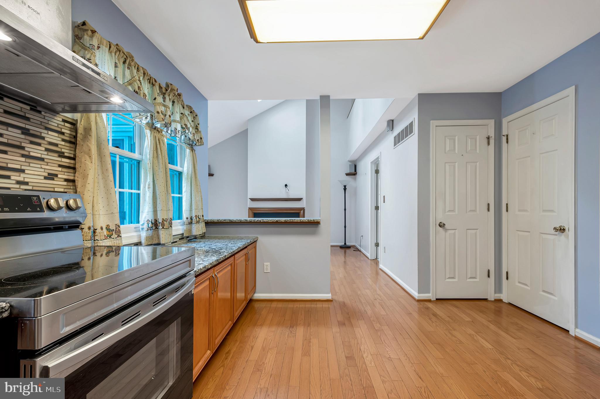 405 Aldon Road Claymont, DE 19703 - Photo 12 of 41 Kitchen with knee wall into family room